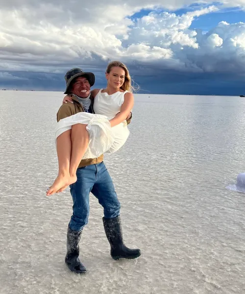 A Visit South America guide with a guest on the Uyuni salt flats