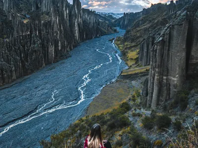The river winding through the canyon between walls of spires, seen from above