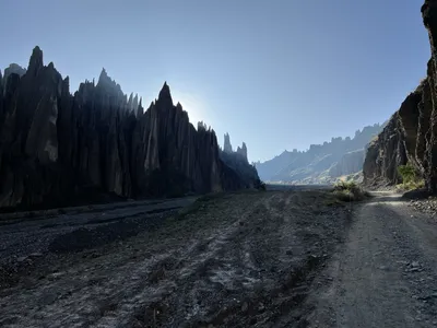 The road into Valle de las Ánimas at dusk, spires in silhouette