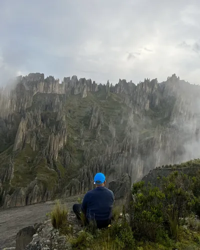 Valle de las Ánimas: a hiker among tall spires in the mist